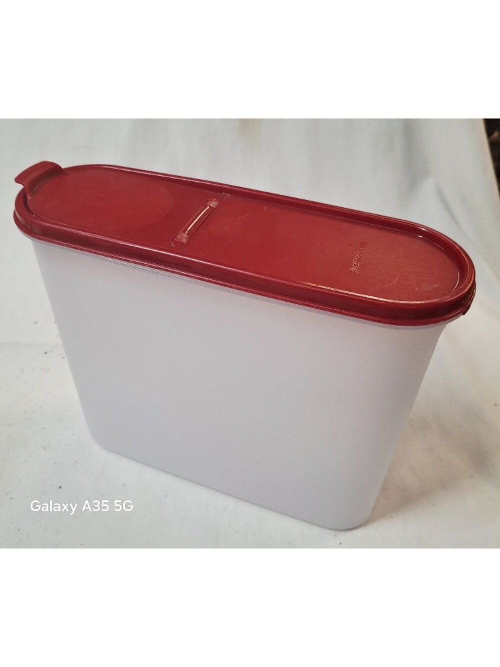 Tupperware Plastic Oval Storage Container With Red Flip Lid - 10" X 6" X 3"